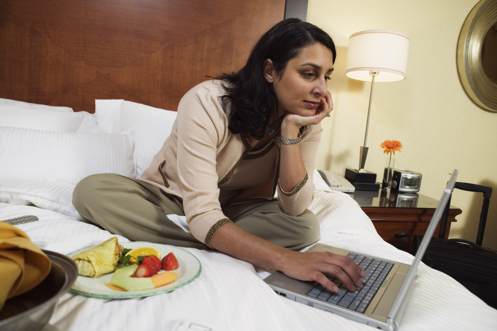 woman working in a hotel room