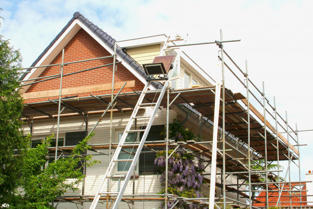 Fixing a house to enhance its appearance.